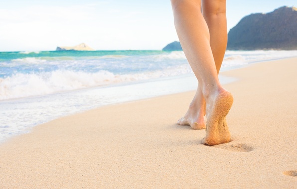 foot-on-the-beach-sand-sea
